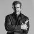 Mel Gibson (man with harmonica)